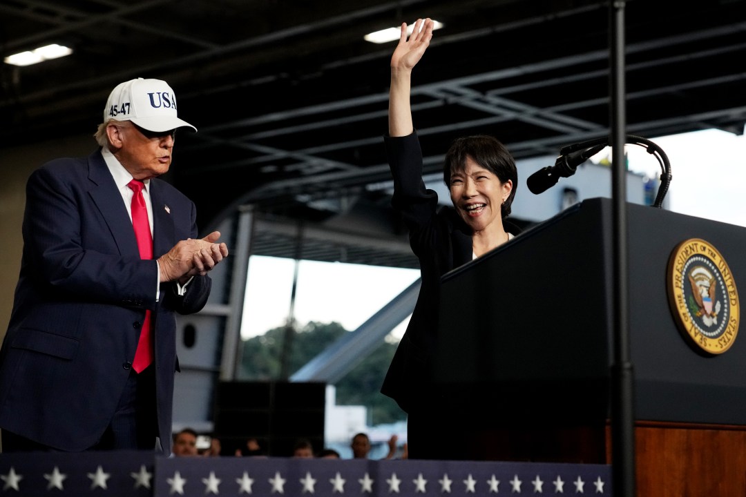 U. S. President donald trump applauds as japanese prime minister sanae takaichi