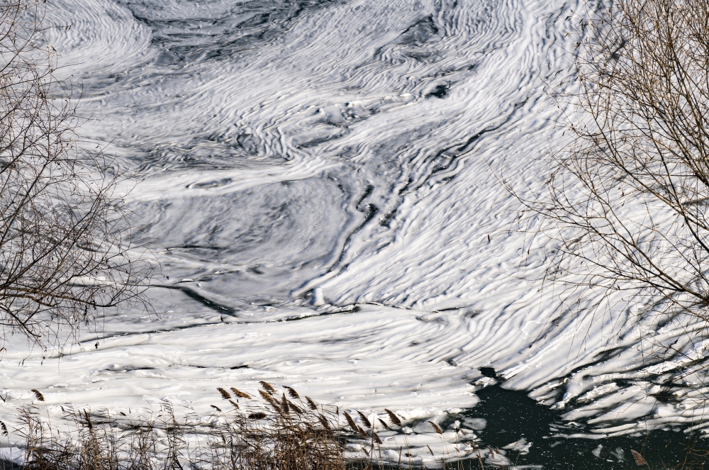 Picturesque tisza river is covered with ice in northern hungary