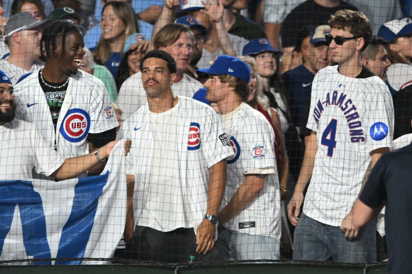 Bears qb caleb williams ready to get to work after summer of 'madden,' pca and ye 2026 - justice Bears quarterback caleb williams, second from left, bulls players caleb wilson, left, and matas buzelis, right, along with music video director cole bennett, second from right, celebrate after the cubs defeated the milwaukee brewers at wrigley field on thursday, sept. 3, 2026.
