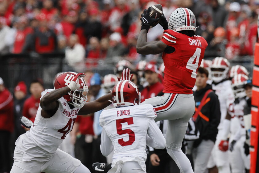 Big ten football preview: ohio state, oregon or indiana at the top? Where do illinois, northwestern come in? 2026 - justice Ohio state receiver jeremiah smith, right, catches a pass against indiana on saturday, nov. 23, 2024, in columbus, ohio.