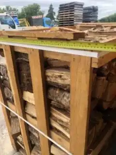 Oak firewood logs 25 cm kiln dried Oak firewood logs 25 cm kiln dried on pallet crates 1m3 uniform hardwood logs for fireplaces wood stoves and pizza ovens wholesale firewood supply oak firewood logs cm