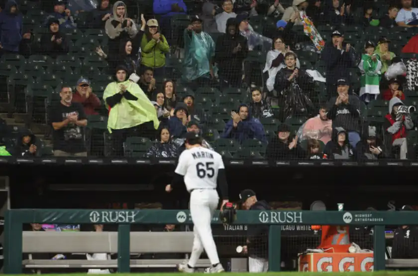 Fans give a standing ovation to Davis Martin #65 of the Sox at Rate Field after being removed from the game during the fifth inning against the Tigers on September 20, 2026 in Chicago