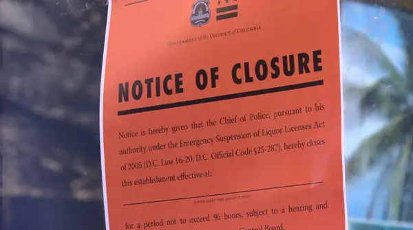'notice of closure' posted at cafe 8 in d. C.