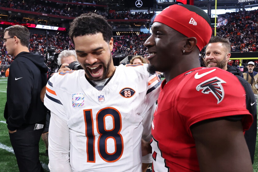 Bears qb caleb williams wins nfc offensive player of the week 2026 - justice Atlanta, georgia - october 18: olamide zaccheaus #14 of the atlanta falcons congratulates caleb williams #18 of the chicago bears after the game at mercedes-benz stadium on october 18, 2026 in atlanta, georgia. (photo by kevin c. Cox/getty images) org xmit: 776511764