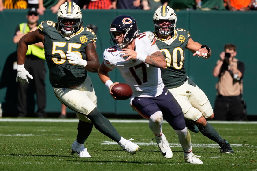 Bears' grades vs. Packers are in. How did they do in green bay? 2026 - justice Chicago bears' tyson bagent tries to get away from green bay packers' lukas van ness and chris mcclellan during the first half of an nfl football game in green bay, wis. , sunday, oct. 11, 2026. (ap photo/nam huh) org xmit: flmg154