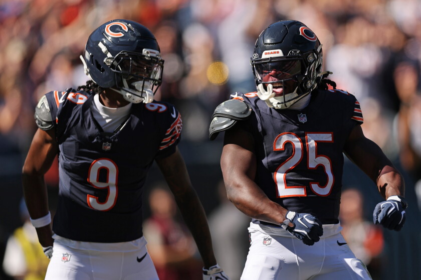 CHICAGO, ILLINOIS - OCTOBER 04: Kyle Monangai #25 of the Chicago Bears celebrates with Jahdae Walker #9 after scoring a touchdown during the first quarter of the game against the New York Jets at Soldier Field on October 04, 2026 in Chicago, Illinois. (Photo by Michael Reaves/Getty Images) ORG XMIT: 776511734