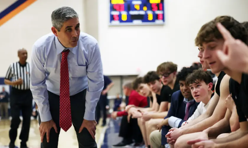 Benet's Gene Heidkamp talks to players during the Redwings' 52-43 victory against DePaul Prep in the Pontiac Holiday Tournament championship game, December 31, 2025, Pontiac, Illinois. 
