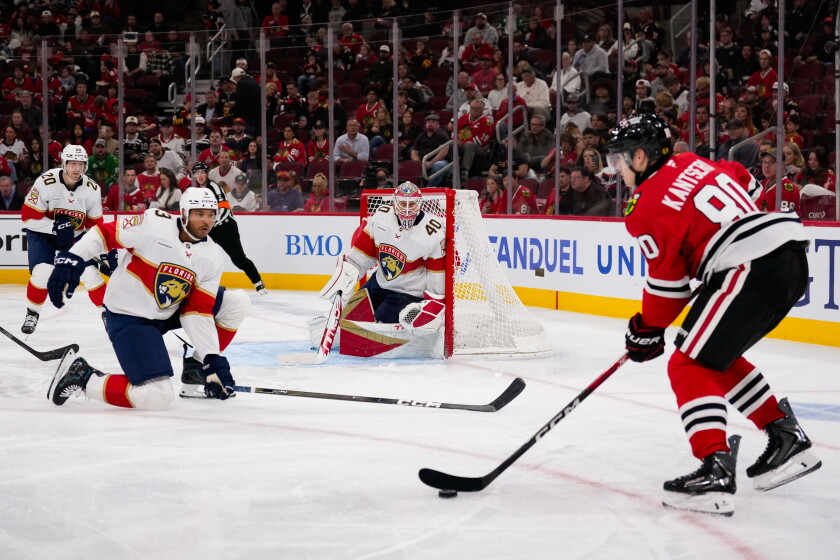 Ex-blackhawks defenseman seth jones isn't exactly welcomed back, has no hard feelings 2026 - justice Roman kantserov skates with the puck while seth jones (front left) defends during the second period sunday.