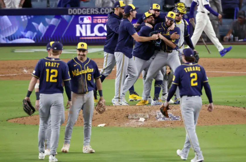 Aaron ashby #26 of the brewers celebrates with teammates after recording the final out of the game against the  dodgers in game 4 of the national league championship series at dodger stadium on october 15, 2026 in los angeles.
