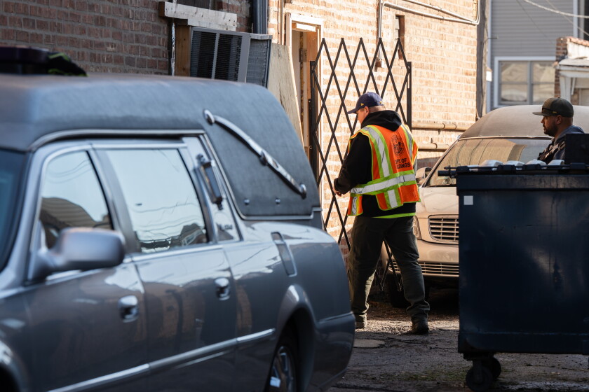 City inspects funeral home where 55 decaying bodies were found amid calls for its demolition 2026 - justice A worker with the department of buildings enters the south chicago chapel, friday, oct. 23, 2026.