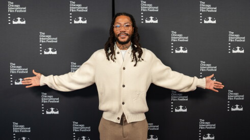 Derrick rose poses on the red carpet at the reva and david logan center for the arts during the chicago international film festival.
