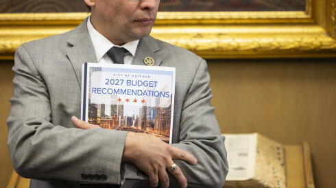 How we photographed the new baby penguins at brookfield zoo 2026 - justice Ald. Raymond lopez (15th) holds budget documents.