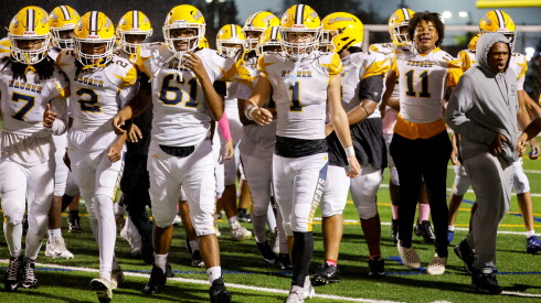 Ryden carrasco scores 3 tds as rauner beats schurz in winner-take-all battle for a state playoff berth 2026 - justice Rauner’s ryden carrasco (1), tamarion carter (61), armani tillman (2) and amir williams, jr (7) celebrate with teammates after winning the game against schurz at lane stadium.