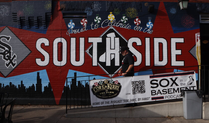 Sox postseason run has instilled pride in the south side 2026 - justice Jacob swartley, 49, of bridgeport walks past a mural during a break while watching a major league baseball playoff game between the chicago white sox and the houston astros at the cork & kerry at the park in chicago, illinois, u. S. , sept. 29, 2026.